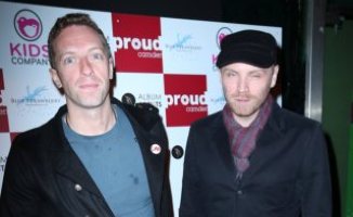 Jonny Buckland, Chris Martin - 28-11-2012 - I Coldplay partecipano alla mostra di graffiti di Paris